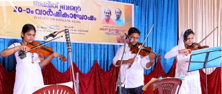Students performing on violin