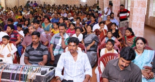Spectators watching student's performances