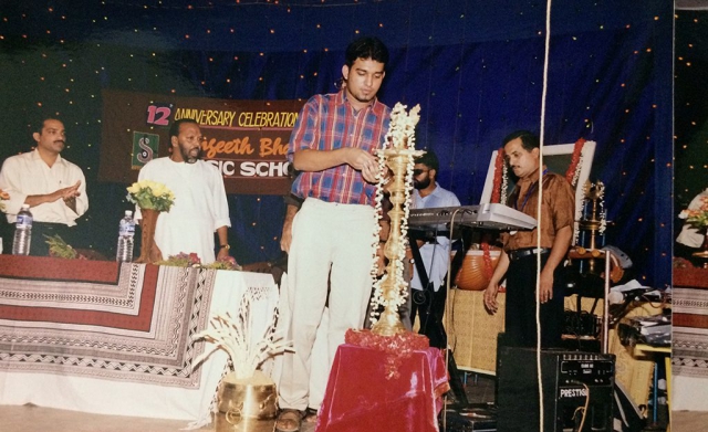 Stephen Devassy lighting the ceremonial lamp